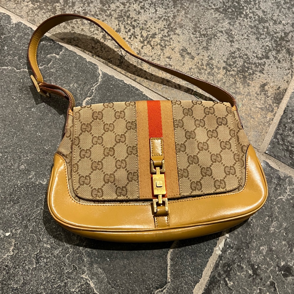 Gucci small hand bag with red stripe